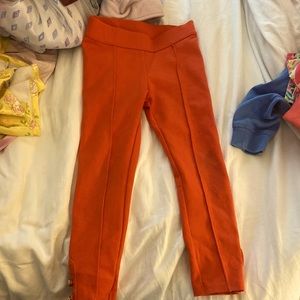 Janie and Jack orange pant with gold button ankle detail. Slim fit. Size 4T.